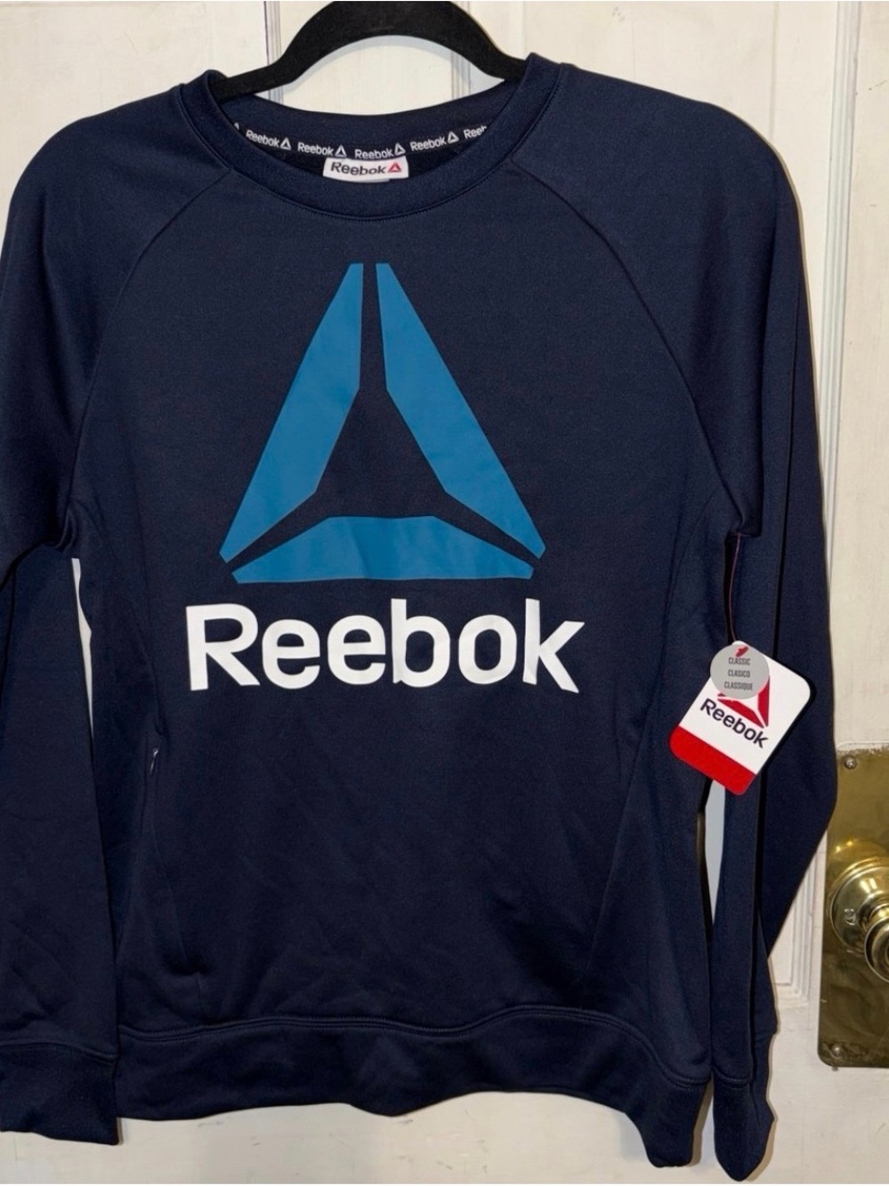Reebok Navy Blue Sweatshirt with Light Blue Logo and White Text